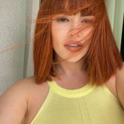 Redhead MILF Selina Dubai escort